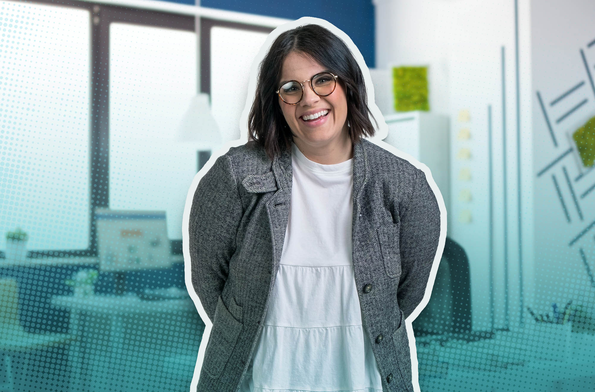 Woman waving in an office space